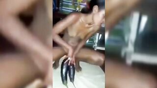 Tanzania Babe Using Huge Egg Plant In Pussy