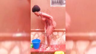 Uniben Girl Stacy Bathing Outside